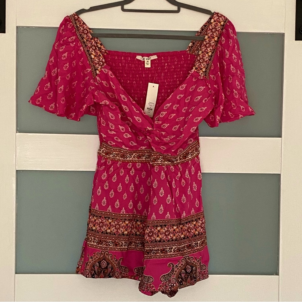 Francesca’s keyhole pink romper